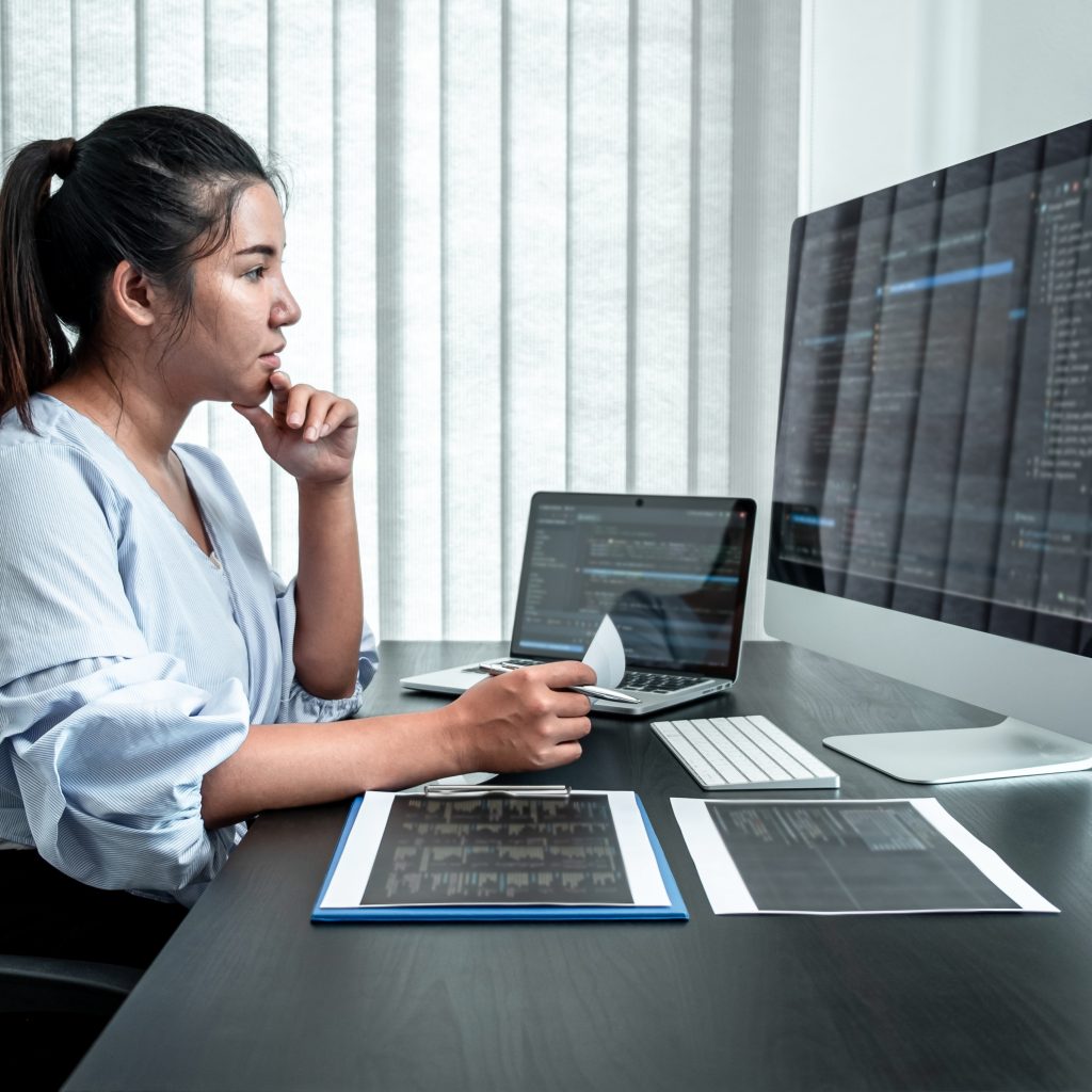 Female Developer Working on Software Program